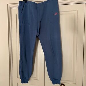 Nike Blue Joggers with Pink Emblem